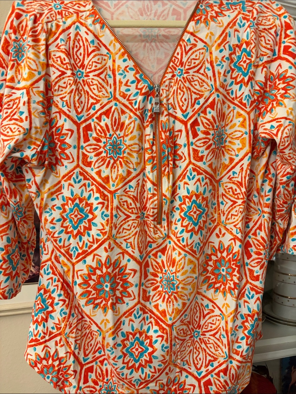 Belle /Kim Gravel geometric tile print orange,turq. white,half zip 3/4 sleeves.